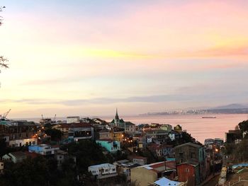 High angle view of buildings against sky during sunset