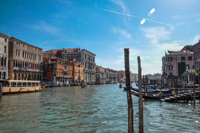 Canal passing through city buildings