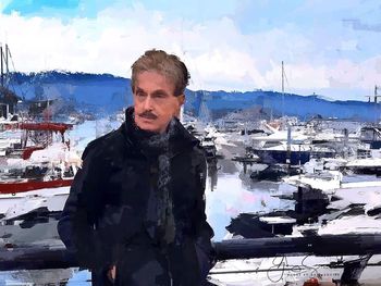 Portrait of man with sea in background