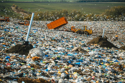 High angle view of garbage by river