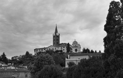 Historic building against cloudy sky