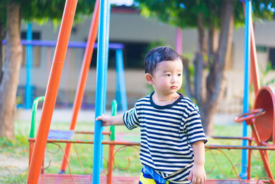 Boy looking at playground