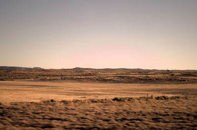 Scenic view of landscape against clear sky