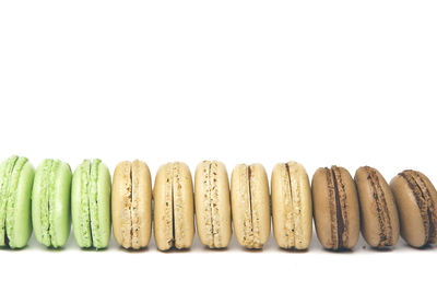 Close-up of candies against white background