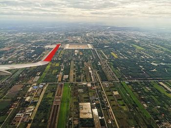 Aerial view of city against sky