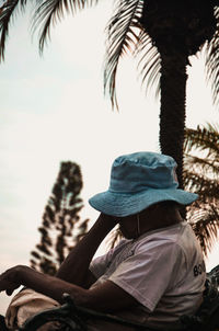 Low angle view of man against sky