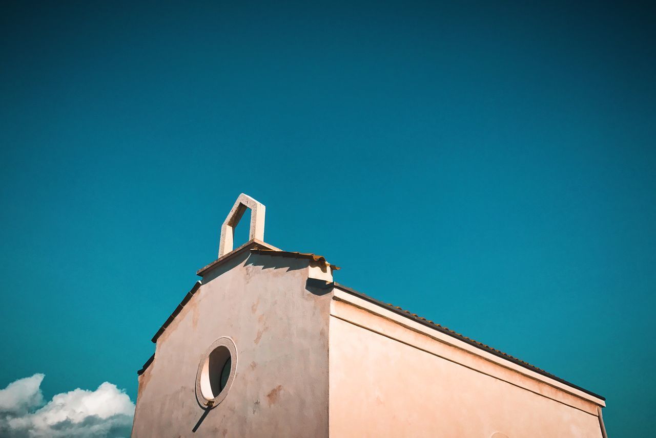 LOW ANGLE VIEW OF CHURCH AGAINST BLUE SKY