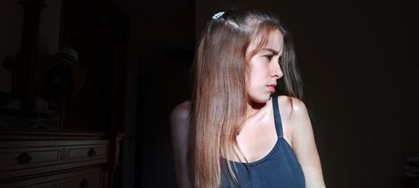 Portrait of beautiful woman at home