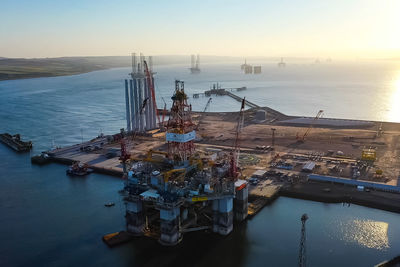 High angle view of pier over sea against sky
