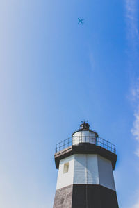 Low angle view of building against blue sky