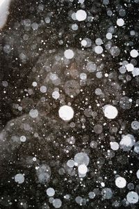 Full frame shot of snowflakes on snow