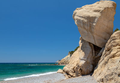 Scenic view of sea against clear blue sky