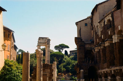 Old buildings against sky