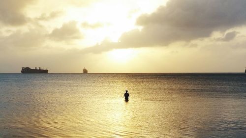 Scenic view of sea at sunset