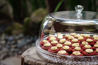 Close-up of cupcakes in container on table