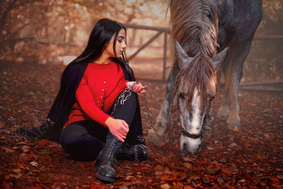 Young woman in a horse