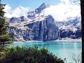 Scenic view of snowcapped mountain against sky