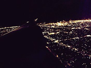 Illuminated cityscape at night