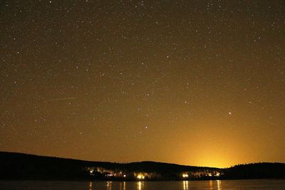 Scenic view of star field against sky at night