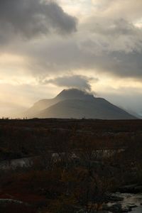 Scenic view of landscape against sky during sunset