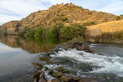 Watermills from the guadiana in mértola, where you can see a small waterfall due to the current 
