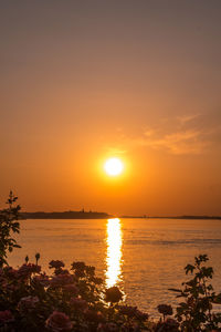 Scenic view of sea against sky during sunset