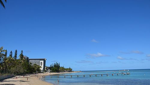 View of calm sea against blue sky