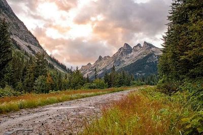 Scenic view of landscape against cloudy sky