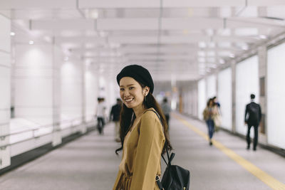 Portrait of smiling young woman