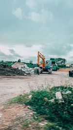 Construction site on field against sky