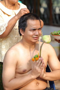 Man doing ordination at temple