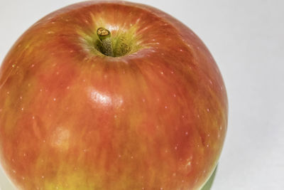 Close-up of apple against white background