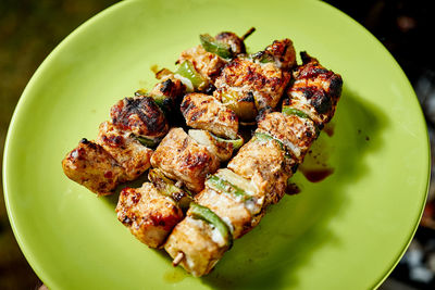 High angle view of meat in plate on table