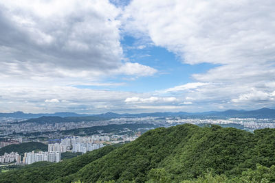 Aerial view of townscape against sky