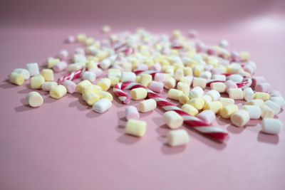 High angle view of multi colored candies on table