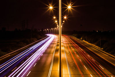 Light trails on road at night