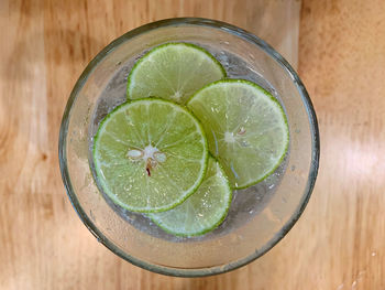 High angle view of fruits in glass on table