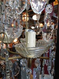 Close-up of illuminated lanterns hanging on table in restaurant