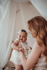 Mother and daughter at home