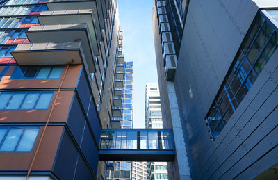 Low angle view of modern buildings against sky