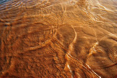 Full frame shot of rippled beach water