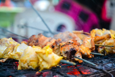 Close-up of food on barbecue grill