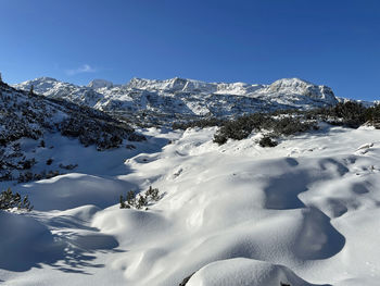 Snow covered mountain against sky