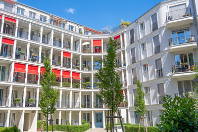 Modern apartment building with a beautiful courtyard seen in berlin, germany