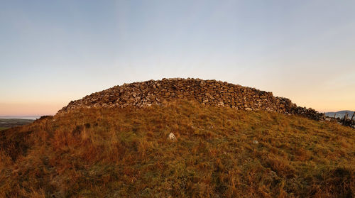 Scenic view of rocky mountains against clear sky