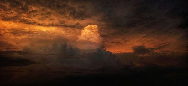 Scenic view of dramatic sky during sunset