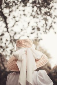 Rear view of woman wearing hat