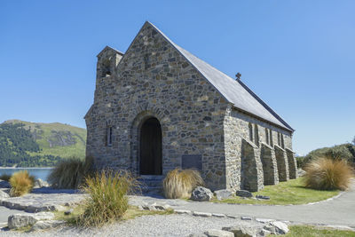 Historic building against clear blue sky