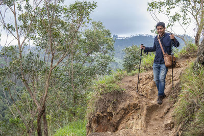 Man descending from adam's peak close to ella in sri lanka