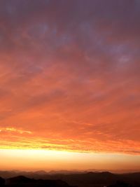 Scenic view of dramatic sky during sunset